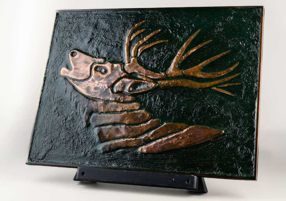 Handcrafted metal stag wall sculpture by Irish artist Richard Andreucetti, suitable for interior display